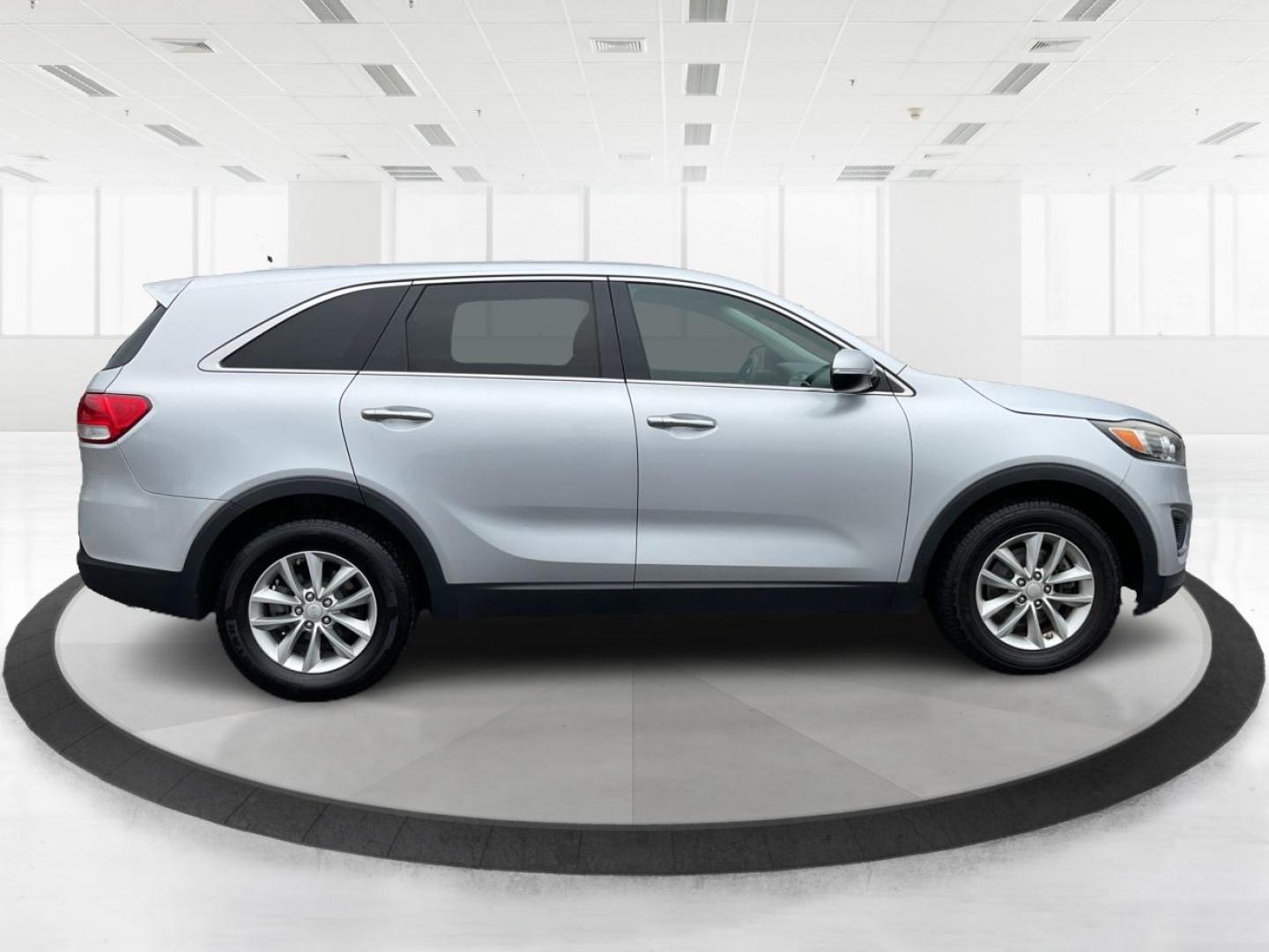 2016 Sparkling Silver Kia Sorento L 2WD (5XYPG4A31GG) with an 2.4L L4 DOHC 16V engine, 6-Speed Automatic transmission, located at 4508 South Dixie Dr, Moraine, OH, 45439, (937) 908-9800, 39.689976, -84.218452 - Photo#1