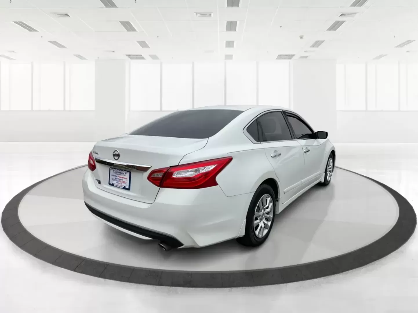 2016 Nissan Altima 2.5 S (1N4AL3AP7GN) with an 2.5L I-4 DOHC engine, located at 1951 S Dayton Lakeview Rd., New Carlisle, OH, 45344, (937) 908-9800, 39.890999, -84.050255 - Photo#2