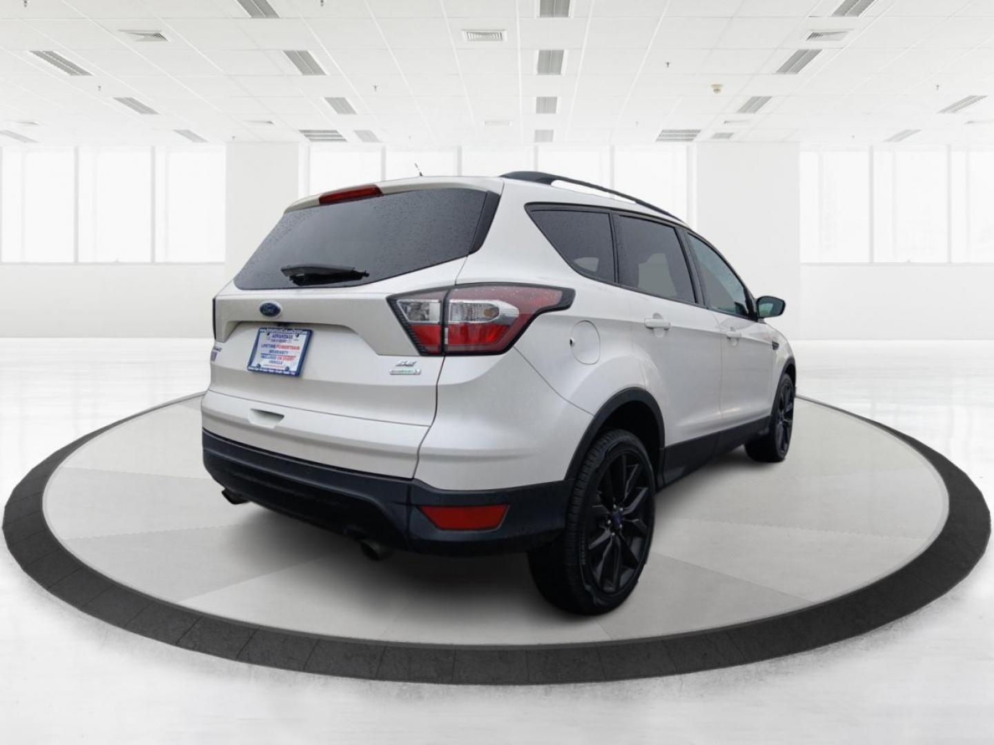 2017 Ford Escape SE FWD (1FMCU0GDXHU) with an 1.5L L4 DOHC 16V engine, 6-Speed Automatic transmission, located at 880 E. National Road, Vandalia, OH, 45377, (937) 908-9800, 39.891918, -84.183594 - Photo#2