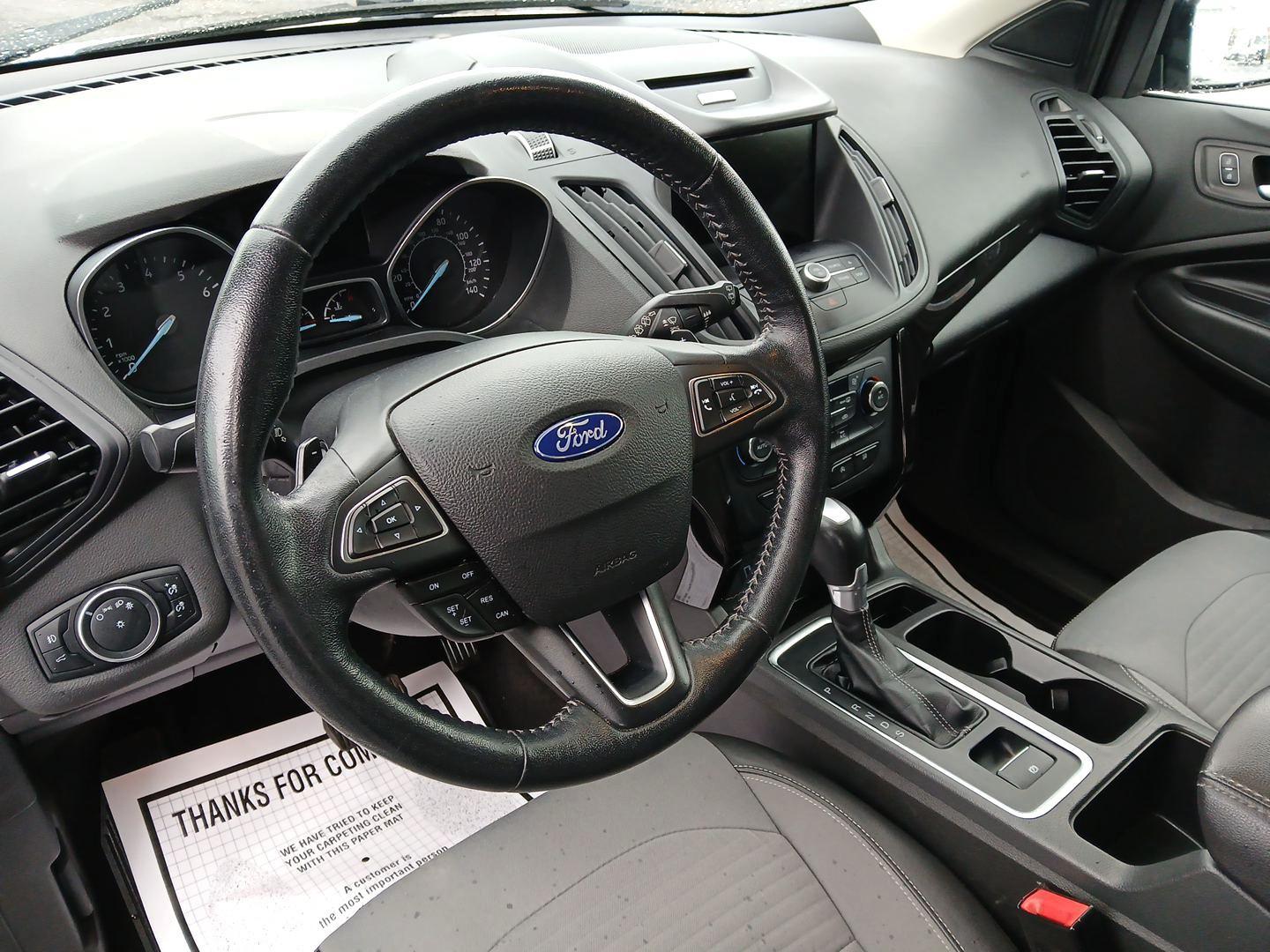 2017 Ford Escape SE FWD (1FMCU0GDXHU) with an 1.5L L4 DOHC 16V engine, 6-Speed Automatic transmission, located at 880 E. National Road, Vandalia, OH, 45377, (937) 908-9800, 39.891918, -84.183594 - Photo#8