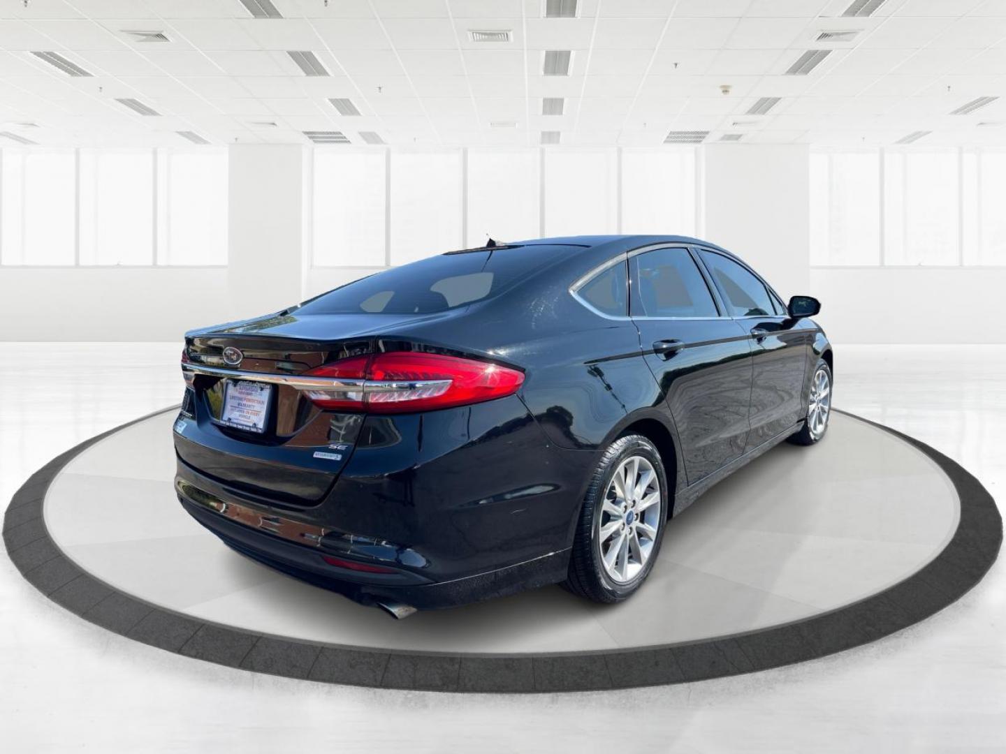 2017 Ford Fusion SE (3FA6P0HD1HR) with an 1.5L L4 DOHC 16V engine, 6-Speed Automatic transmission, located at 1230 East Main St, Xenia, OH, 45385, (937) 908-9800, 39.688026, -83.910172 - Photo#2
