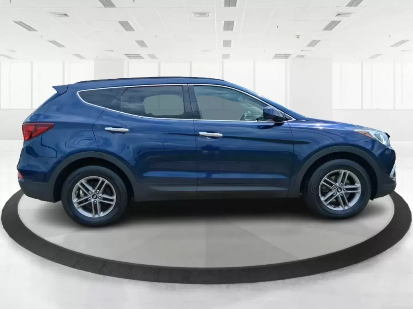 2017 Hyundai Santa Fe 2.4L (5XYZUDLB0HG) with an Theta II 2.4L I-4 gasoline direct injection engine, located at 1230 East Main St, Xenia, OH, 45385, (937) 908-9800, 39.688026, -83.910172 - Photo#1