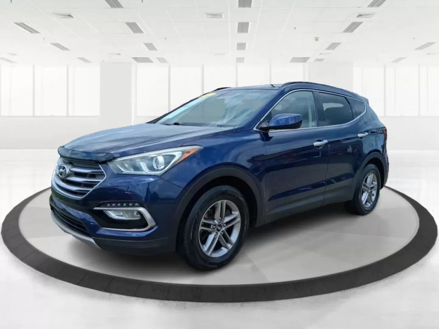 2017 Hyundai Santa Fe 2.4L (5XYZUDLB0HG) with an Theta II 2.4L I-4 gasoline direct injection engine, located at 1230 East Main St, Xenia, OH, 45385, (937) 908-9800, 39.688026, -83.910172 - Photo#8