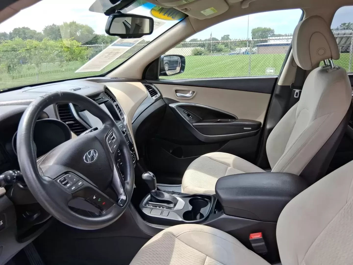 2017 Hyundai Santa Fe 2.4L (5XYZUDLB0HG) with an Theta II 2.4L I-4 gasoline direct injection engine, located at 1230 East Main St, Xenia, OH, 45385, (937) 908-9800, 39.688026, -83.910172 - Photo#9