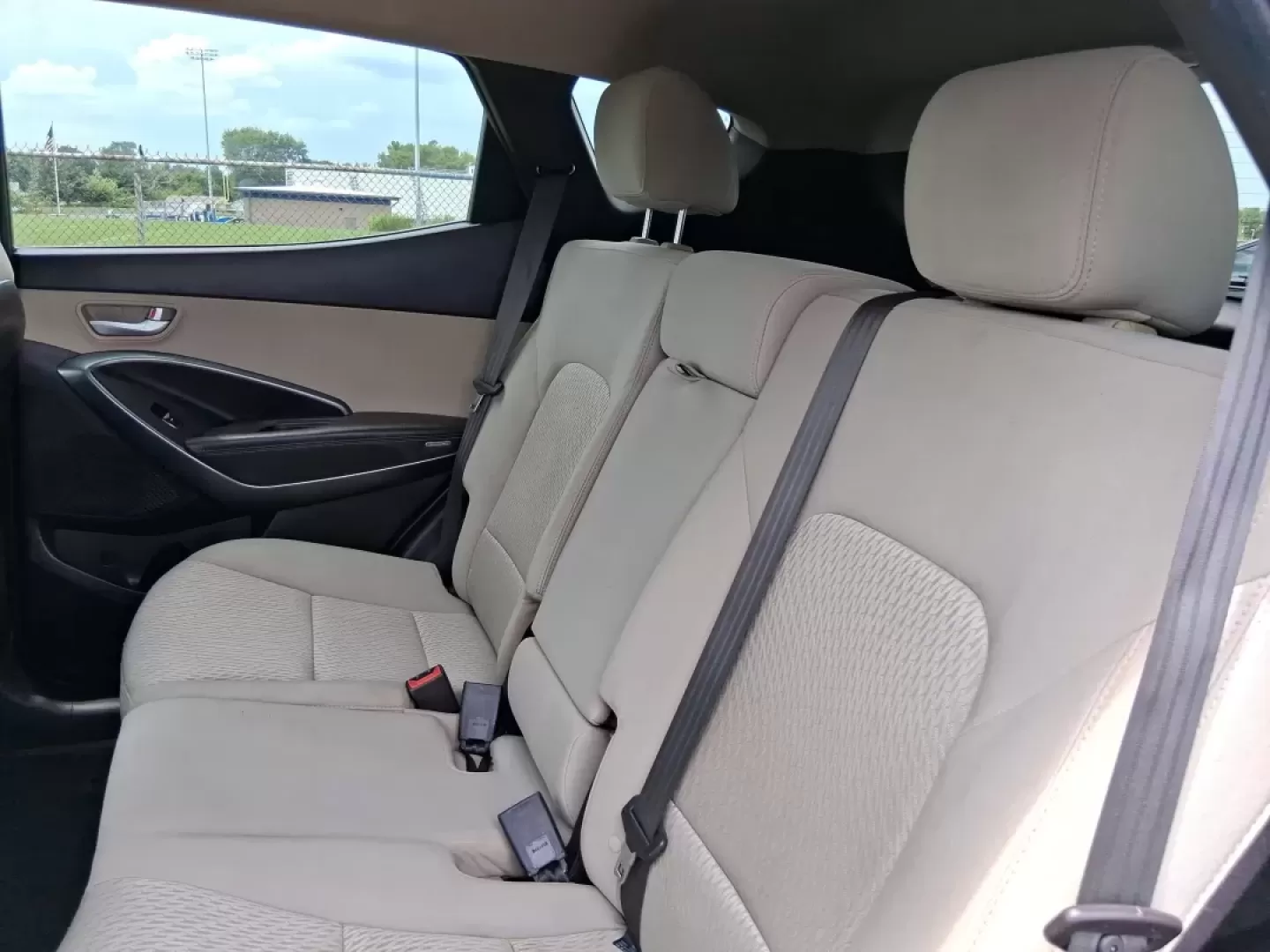 2017 Hyundai Santa Fe 2.4L (5XYZUDLB0HG) with an Theta II 2.4L I-4 gasoline direct injection engine, located at 1230 East Main St, Xenia, OH, 45385, (937) 908-9800, 39.688026, -83.910172 - Photo#10