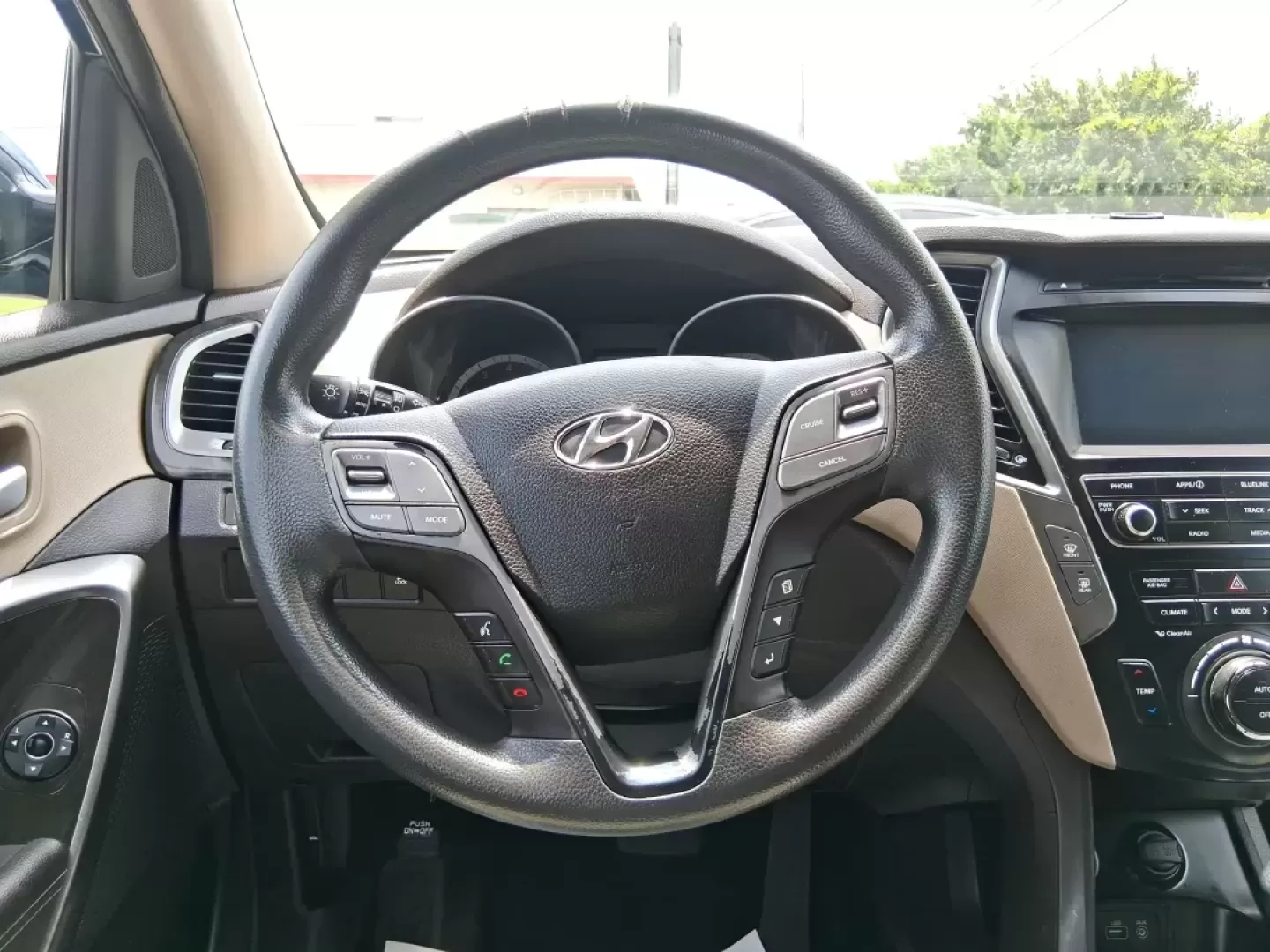 2017 Hyundai Santa Fe 2.4L (5XYZUDLB0HG) with an Theta II 2.4L I-4 gasoline direct injection engine, located at 1230 East Main St, Xenia, OH, 45385, (937) 908-9800, 39.688026, -83.910172 - Photo#16