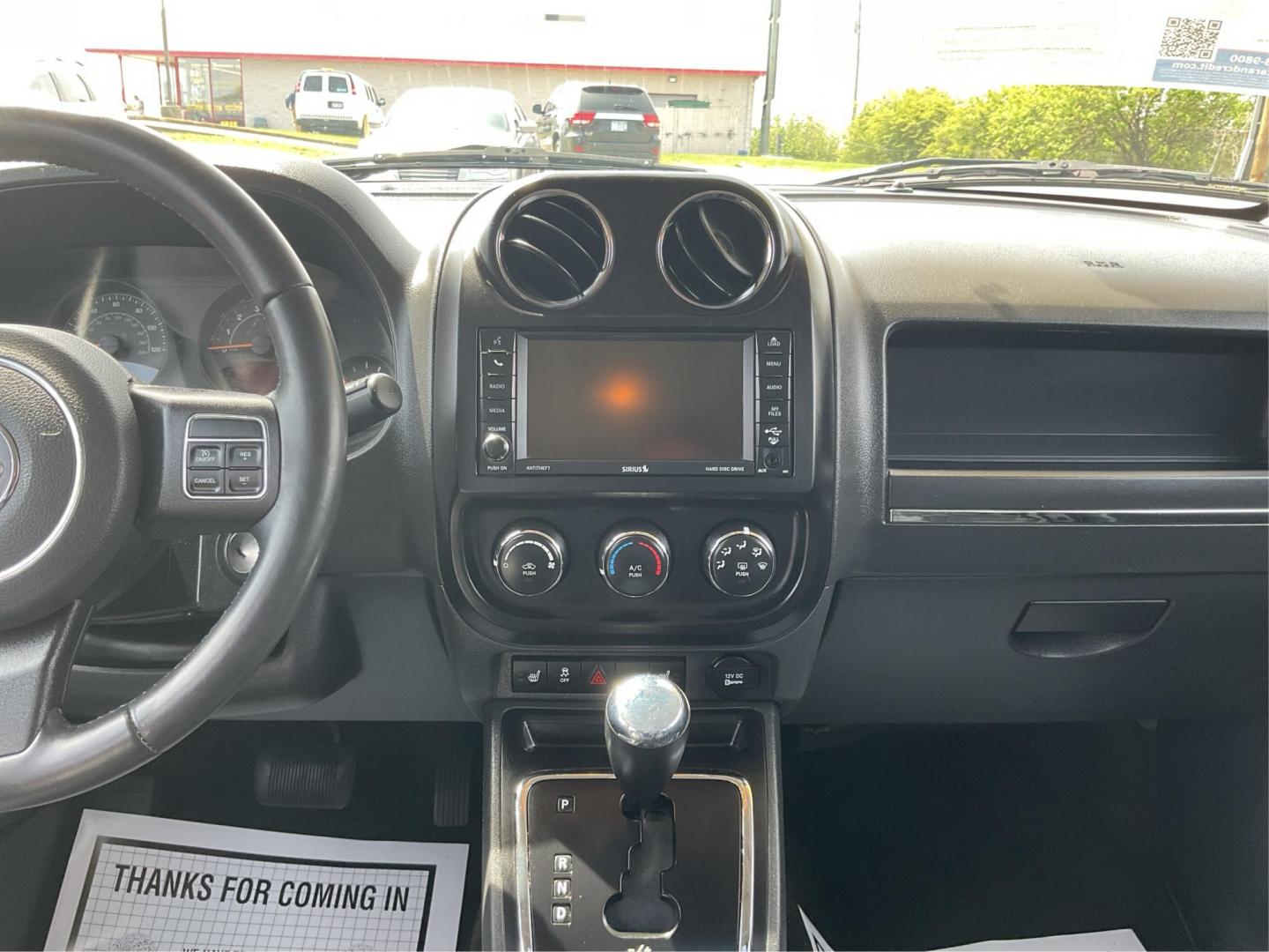 2017 Jeep Patriot High Altitude 4x4 (1C4NJRFB8HD) with an 2.4L I-4 DOHC engine, located at 880 E. National Road, Vandalia, OH, 45377, (937) 908-9800, 39.891918, -84.183594 - Photo#11