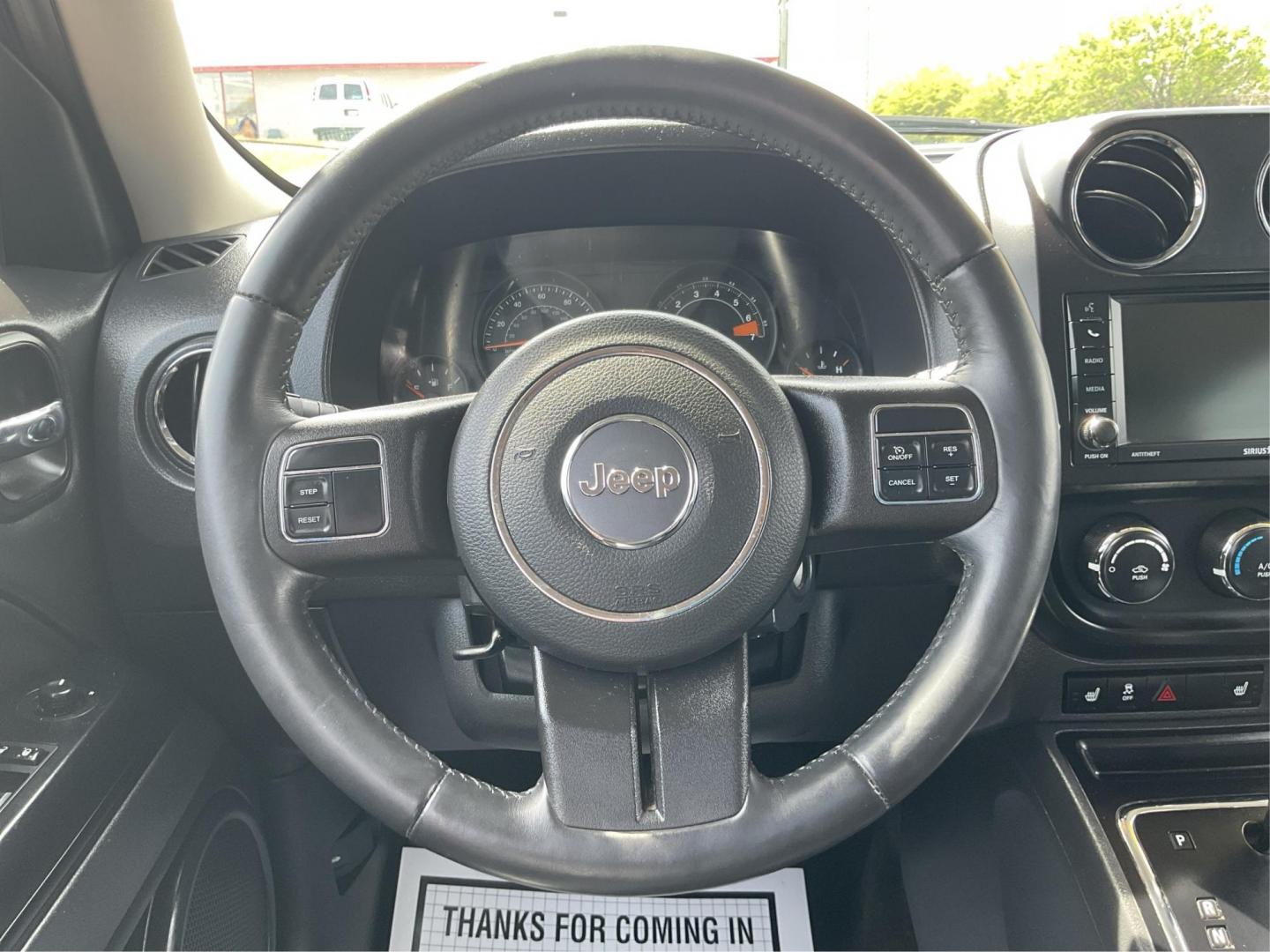 2017 Jeep Patriot High Altitude 4x4 (1C4NJRFB8HD) with an 2.4L I-4 DOHC engine, located at 880 E. National Road, Vandalia, OH, 45377, (937) 908-9800, 39.891918, -84.183594 - Photo#14