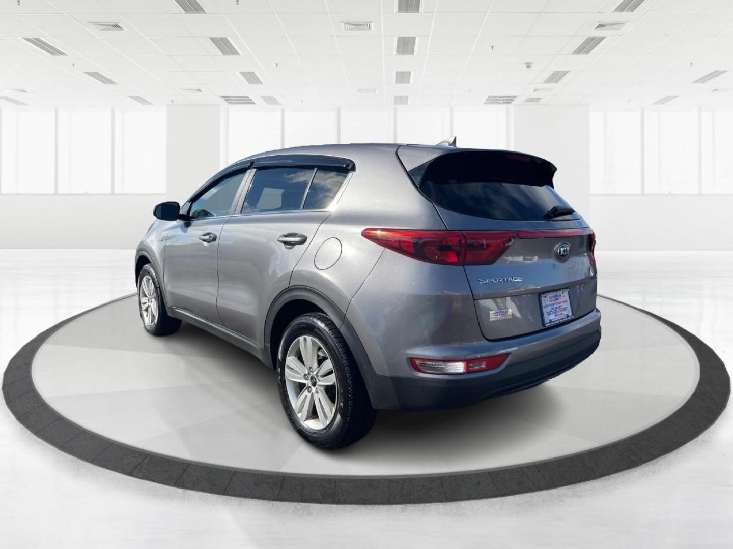 2017 Kia Sportage LX AWD (KNDPMCAC1H7) with an 2.4L V6 DOHC 24V engine, 6-Speed Automatic transmission, located at 8750 N County Rd 25A, Piqua, OH, 45356, (937) 908-9800, 40.164391, -84.232513 - Photo#4