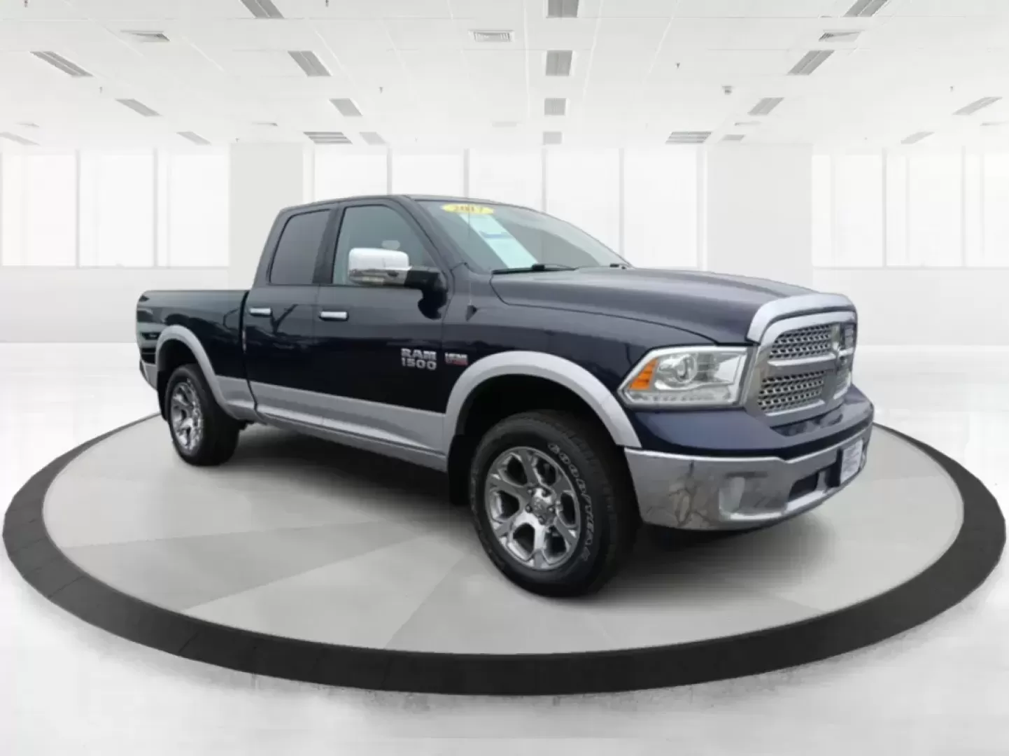 2017 Ram 1500 Laramie Quad Cab 4WD (1C6RR7JT1HS) with an 5.7L V8 OHV 16V engine, 8-Speed Automatic transmission, located at 1184 Kauffman Ave, Fairborn, OH, 45324, (937) 908-9800, 39.807072, -84.030914 - Photo#0