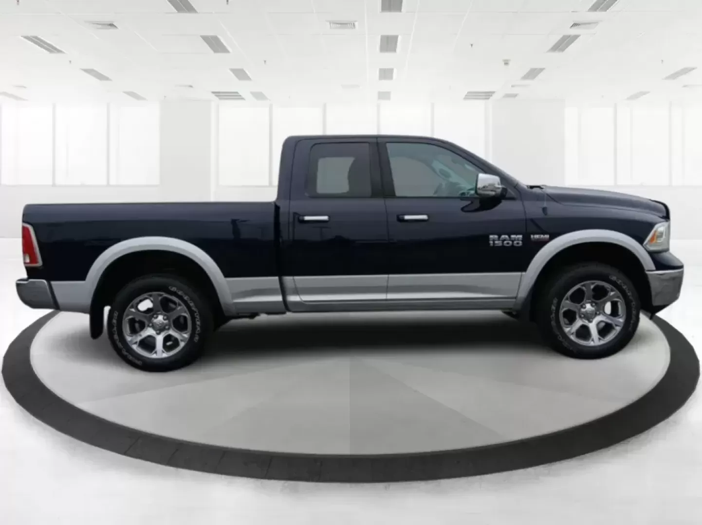 2017 Ram 1500 Laramie Quad Cab 4WD (1C6RR7JT1HS) with an 5.7L V8 OHV 16V engine, 8-Speed Automatic transmission, located at 1184 Kauffman Ave, Fairborn, OH, 45324, (937) 908-9800, 39.807072, -84.030914 - Photo#1