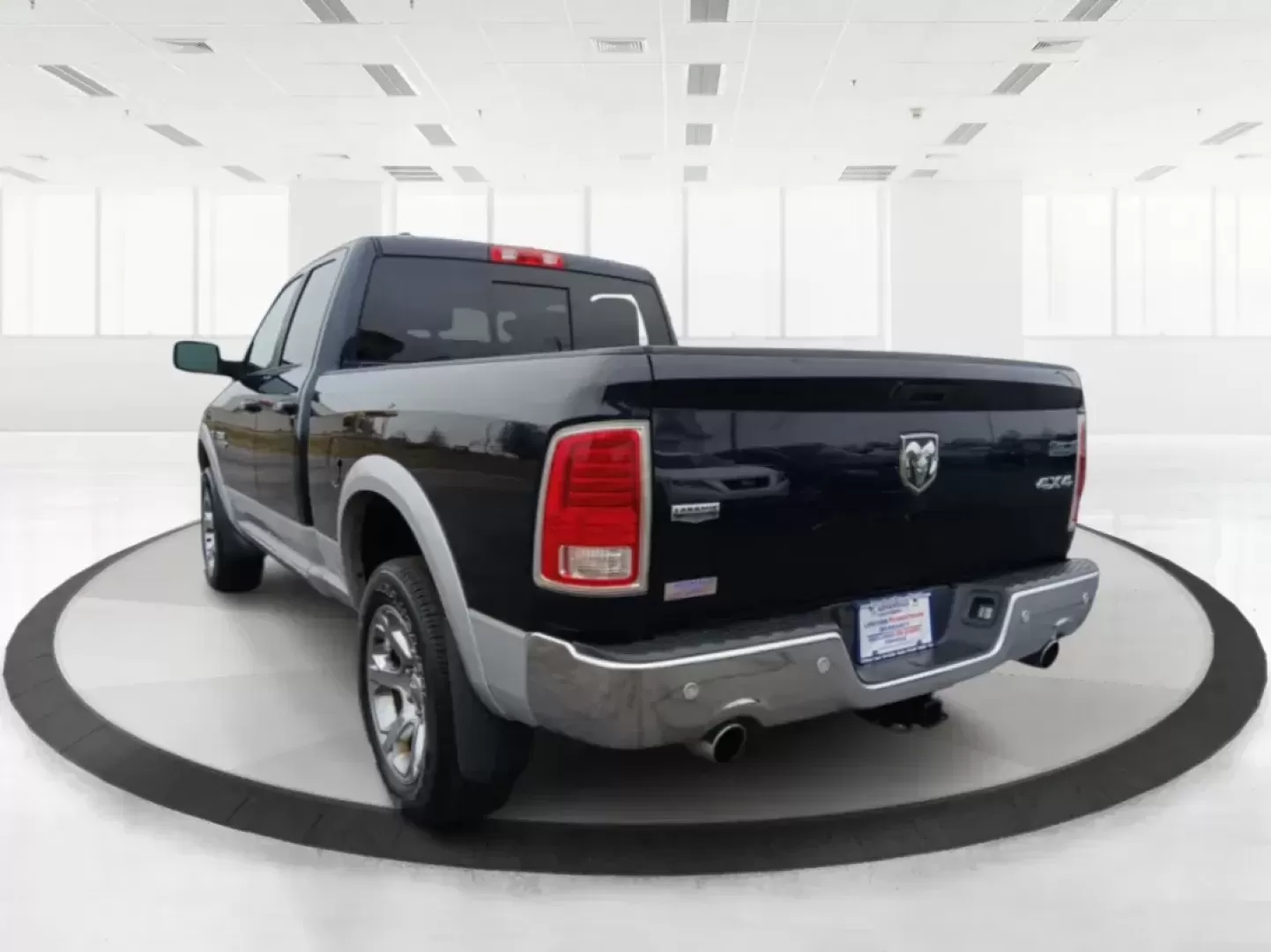 2017 Ram 1500 Laramie Quad Cab 4WD (1C6RR7JT1HS) with an 5.7L V8 OHV 16V engine, 8-Speed Automatic transmission, located at 1184 Kauffman Ave, Fairborn, OH, 45324, (937) 908-9800, 39.807072, -84.030914 - Photo#5