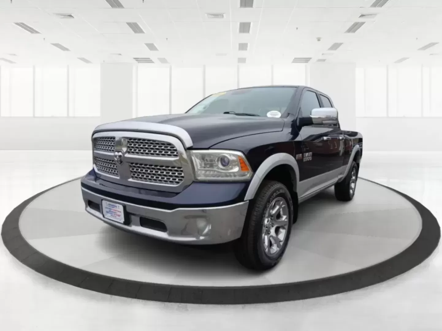 2017 Ram 1500 Laramie Quad Cab 4WD (1C6RR7JT1HS) with an 5.7L V8 OHV 16V engine, 8-Speed Automatic transmission, located at 1184 Kauffman Ave, Fairborn, OH, 45324, (937) 908-9800, 39.807072, -84.030914 - Photo#8