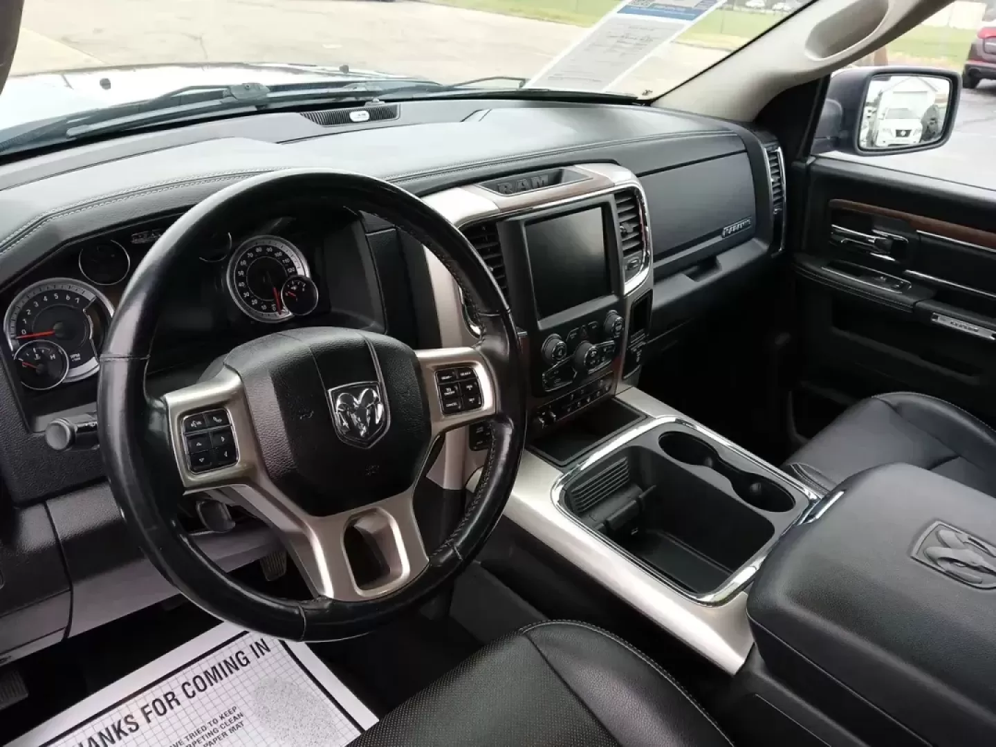 2017 Ram 1500 Laramie Quad Cab 4WD (1C6RR7JT1HS) with an 5.7L V8 OHV 16V engine, 8-Speed Automatic transmission, located at 1184 Kauffman Ave, Fairborn, OH, 45324, (937) 908-9800, 39.807072, -84.030914 - Photo#9