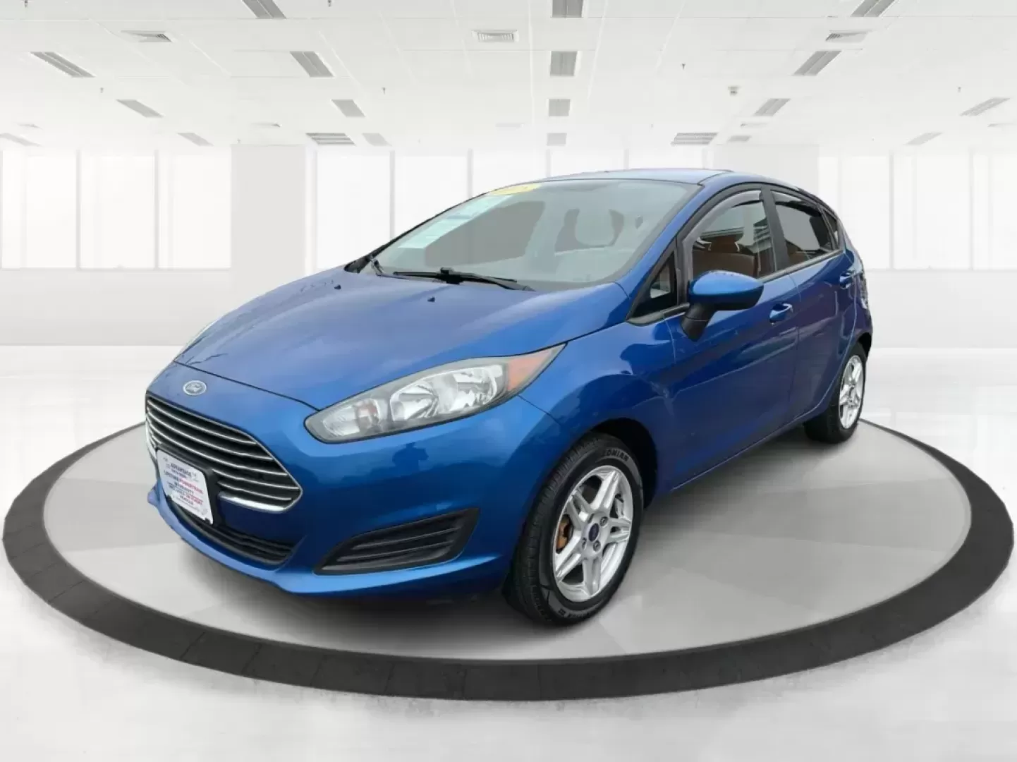 2018 Ford Fiesta SE (3FADP4EJ2JM) with an 1.6L I-4 DOHC engine, located at 8750 N County Rd 25A, Piqua, OH, 45356, (937) 908-9800, 40.164391, -84.232513 - Photo#7