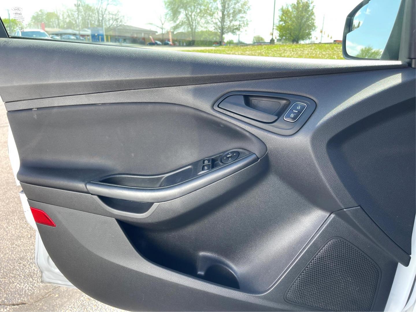 2018 Ford Focus S Sedan (1FADP3E20JL) with an 2.0L L4 DOHC 16V engine, 5-Speed Manual transmission, located at 401 Woodman Dr, Riverside, OH, 45431, (937) 908-9800, 39.760899, -84.123421 - Photo#13