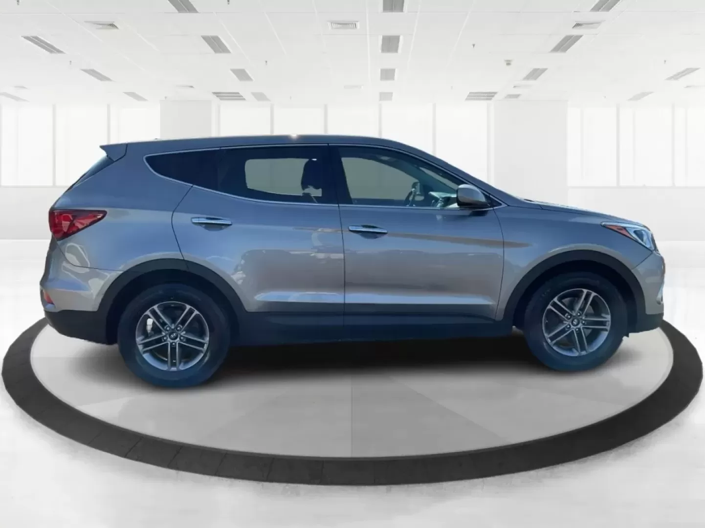 2018 Hyundai Santa Fe 2.4L (5NMZTDLB0JH) with an Theta II 2.4L I-4 gasoline direct injection engine, located at 401 Woodman Dr, Riverside, OH, 45431, (937) 908-9800, 39.760899, -84.123421 - Photo#1