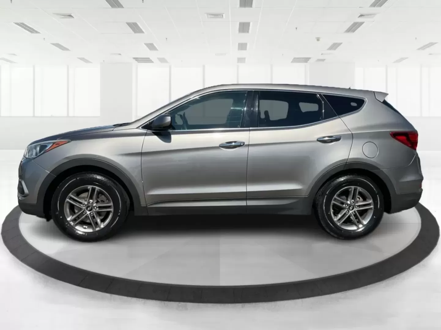 2018 Hyundai Santa Fe 2.4L (5NMZTDLB0JH) with an Theta II 2.4L I-4 gasoline direct injection engine, located at 401 Woodman Dr, Riverside, OH, 45431, (937) 908-9800, 39.760899, -84.123421 - Photo#4