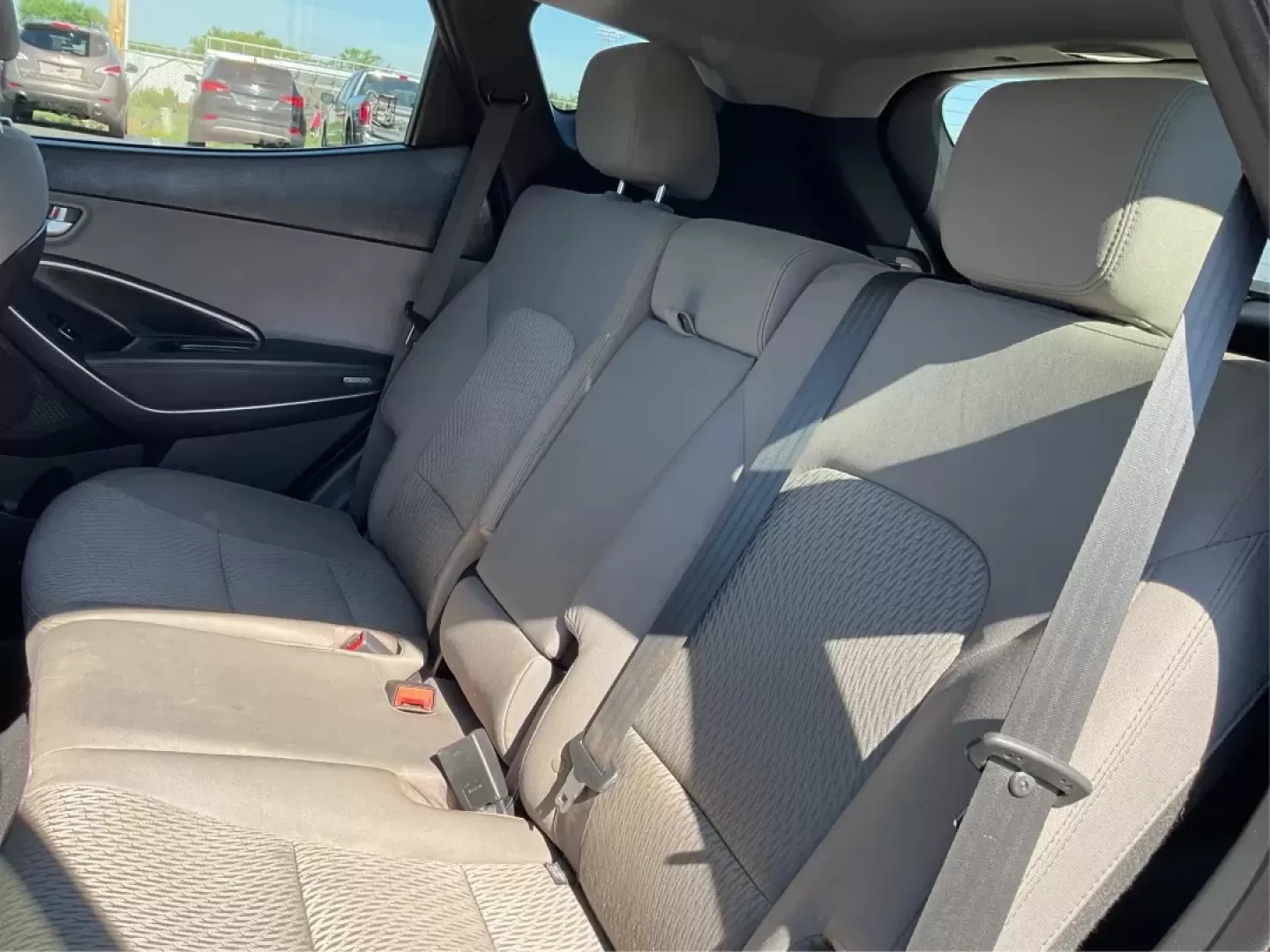 2018 Hyundai Santa Fe 2.4L (5NMZTDLB0JH) with an Theta II 2.4L I-4 gasoline direct injection engine, located at 401 Woodman Dr, Riverside, OH, 45431, (937) 908-9800, 39.760899, -84.123421 - Photo#9