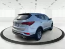 2018 Hyundai Santa Fe Sport 2.4L (5XYZT3LB2JG) with an Theta II 2.4L I-4 gasoline direct injection engine, located at 8750 N County Rd 25A, Piqua, OH, 45356, (937) 908-9800, 40.164391, -84.232513 - Photo#2