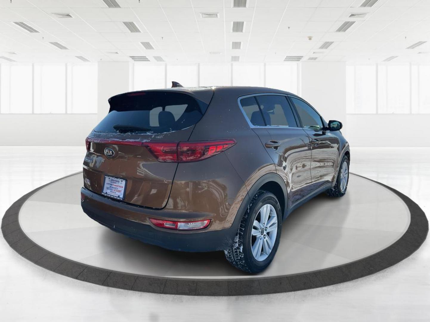 2018 Kia Sportage LX (KNDPM3AC5J7) with an Theta II 2.4L I-4 gasoline direct injection engine, located at 1184 Kauffman Ave, Fairborn, OH, 45324, (937) 908-9800, 39.807072, -84.030914 - Photo#2