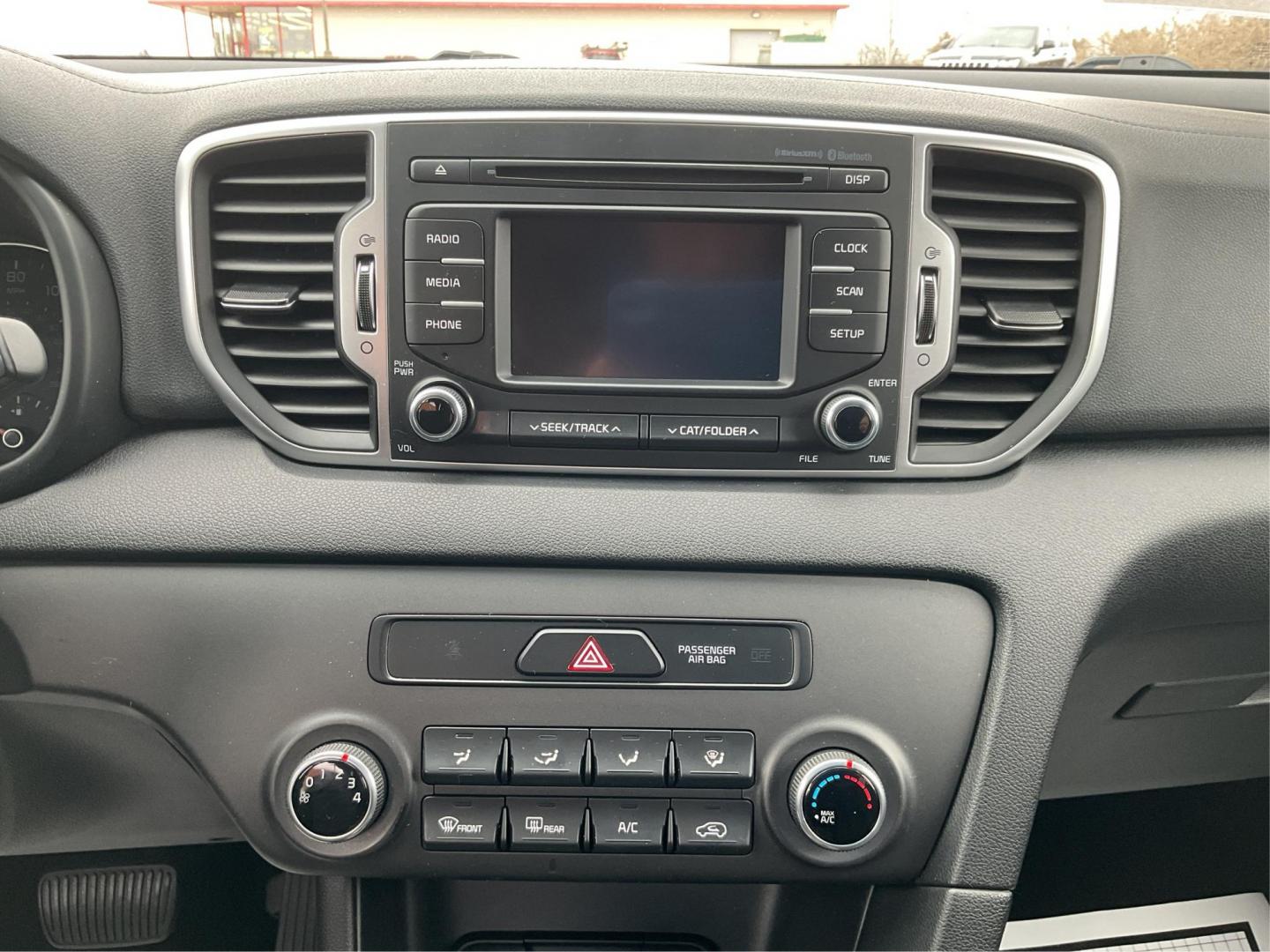 2019 Kia Sportage LX (KNDPMCAC8K7) with an Theta II 2.4L I-4 gasoline direct injection engine, located at 8750 N County Rd 25A, Piqua, OH, 45356, (937) 908-9800, 40.164391, -84.232513 - Photo#11