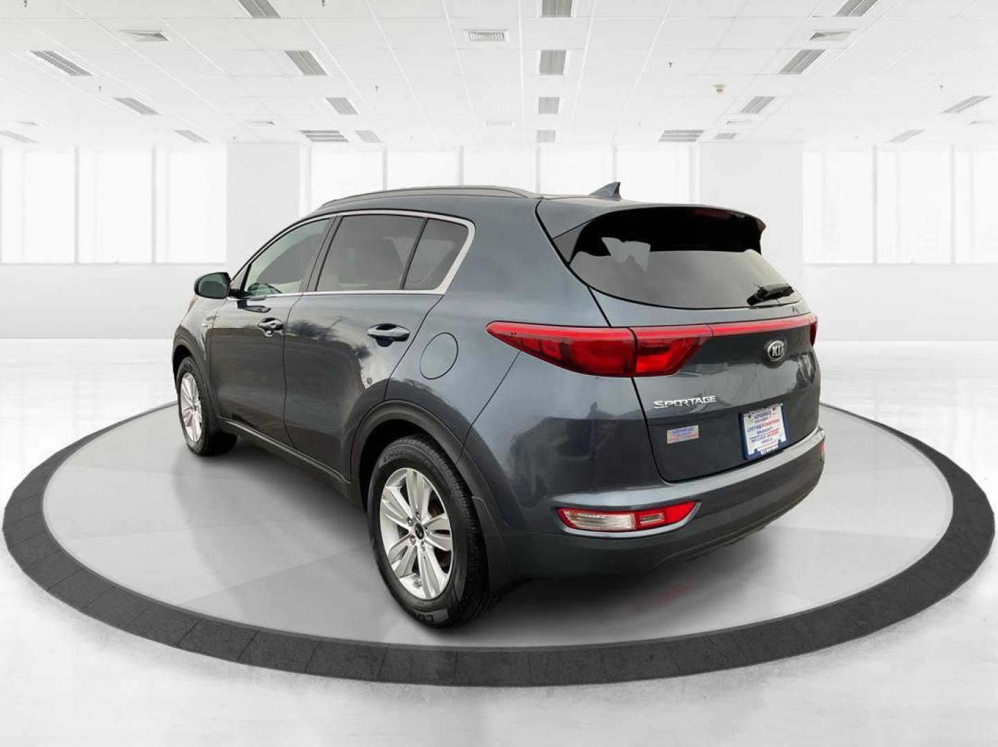 2019 Kia Sportage LX (KNDPMCAC2K7) with an Theta II 2.4L I-4 gasoline direct injection engine, located at 880 E. National Road, Vandalia, OH, 45377, (937) 908-9800, 39.891918, -84.183594 - Photo#4