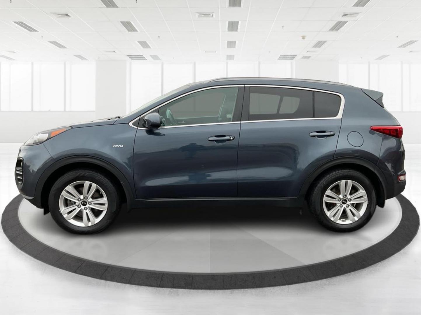 2019 Kia Sportage LX (KNDPMCAC2K7) with an Theta II 2.4L I-4 gasoline direct injection engine, located at 880 E. National Road, Vandalia, OH, 45377, (937) 908-9800, 39.891918, -84.183594 - Photo#5