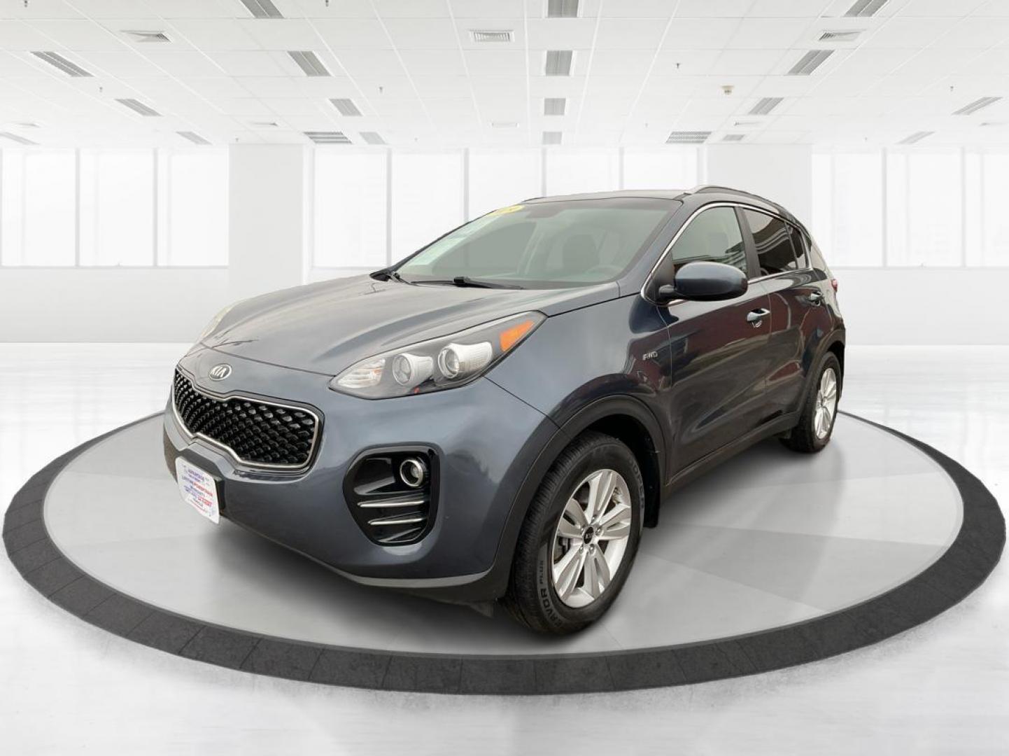 2019 Kia Sportage LX (KNDPMCAC2K7) with an Theta II 2.4L I-4 gasoline direct injection engine, located at 880 E. National Road, Vandalia, OH, 45377, (937) 908-9800, 39.891918, -84.183594 - Photo#7