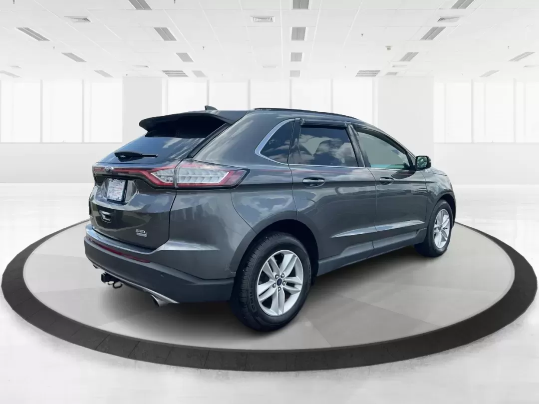 2016 Ford Edge SEL (2FMPK3J91GB) with an 3.5L V-6 DOHC engine, located at 4508 South Dixie Dr, Moraine, OH, 45439, (937) 908-9800, 39.689976, -84.218452 - **Experience the Road Ahead with the 2016 Ford Edge SEL - Your Adventure Awaits!**<br /> <br /> Are you ready for your next road trip or family outing? The 2016 Ford Edge SEL is not just a car; it's a versatile SUV that caters to your lifestyle needs, making it the perfect companion for growing fami - Photo#2
