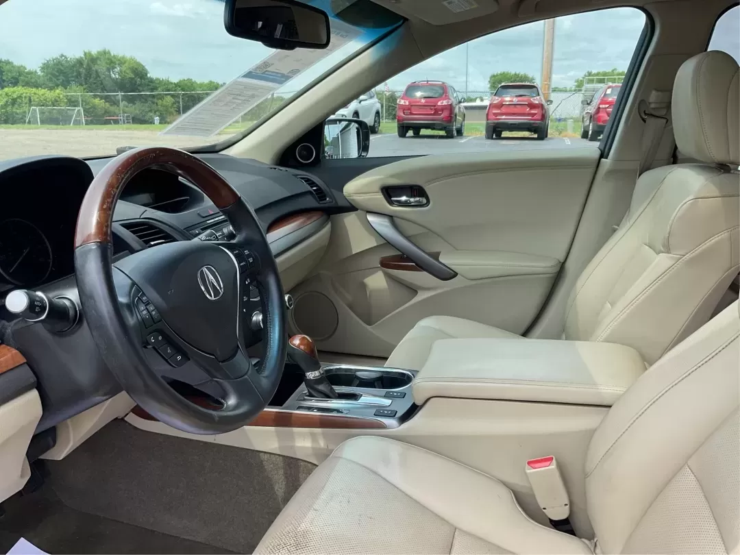 2014 Acura RDX Base (5J8TB3H39EL) with an Other engine, located at 880 E. National Road, Vandalia, OH, 45377, (937) 908-9800, 39.891918, -84.183594 - Unleash the perfect blend of comfort and versatility with the 2014 Acura RDX, a crossover that caters to both your daily grind and weekend adventures. Whether you're a growing family seeking spaciousness, a commuter looking for reliability, or a weekend warrior ready for road trips, this vehicle has - Photo#9