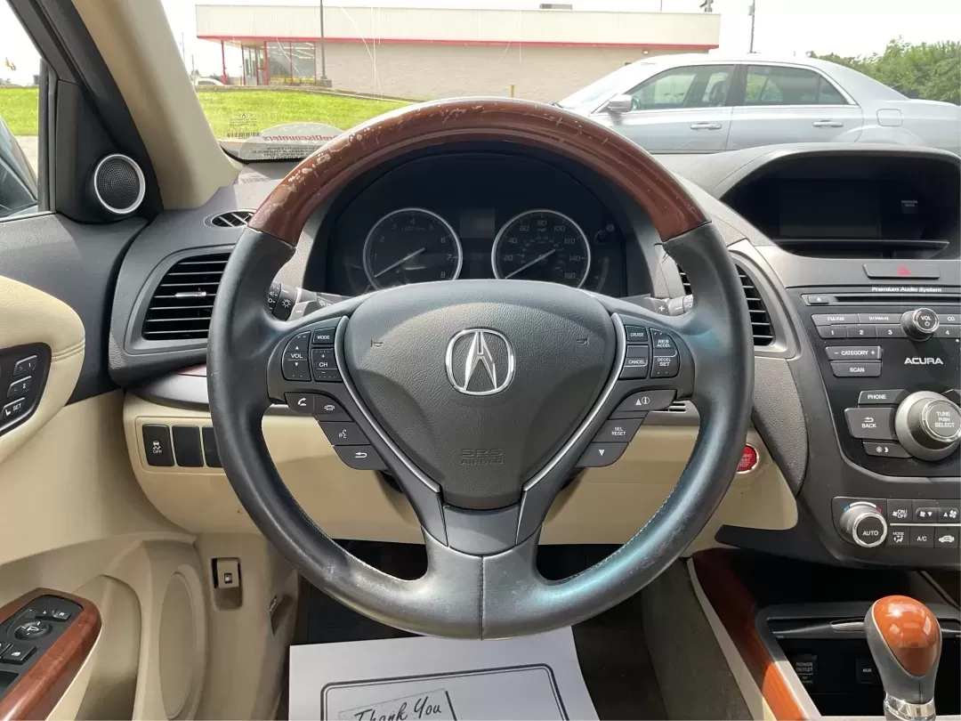 2014 Acura RDX Base (5J8TB3H39EL) with an Other engine, located at 880 E. National Road, Vandalia, OH, 45377, (937) 908-9800, 39.891918, -84.183594 - Unleash the perfect blend of comfort and versatility with the 2014 Acura RDX, a crossover that caters to both your daily grind and weekend adventures. Whether you're a growing family seeking spaciousness, a commuter looking for reliability, or a weekend warrior ready for road trips, this vehicle has - Photo#16