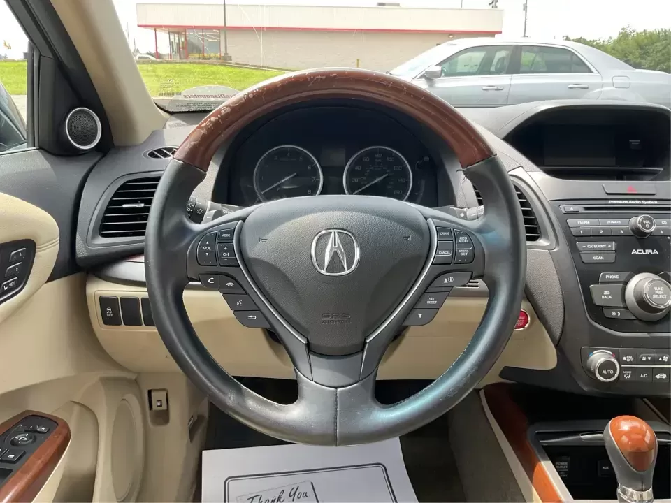 2014 Acura RDX Base (5J8TB3H39EL) with an 2.3L L4 DOHC 16V engine, 6-Speed Automatic transmission, located at 401 Woodman Dr, Riverside, OH, 45431, (937) 908-9800, 39.760899, -84.123421 - Unleash the perfect blend of comfort and versatility with the 2014 Acura RDX, a crossover that caters to both your daily grind and weekend adventures. Whether you're a growing family seeking spaciousness, a commuter looking for reliability, or a weekend warrior ready for road trips, this vehicle has - Photo#16