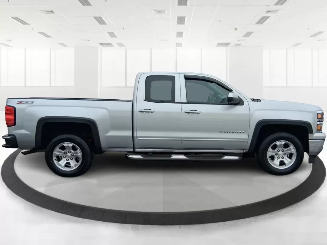 2015 Silver Chevrolet Silverado 1500 LT Double Cab 4WD (1GCVKREC6FZ) with an 5.3L V8 OHV 16V engine, 6-Speed Automatic transmission, located at 1951 S Dayton Lakeview Rd., New Carlisle, OH, 45344, (937) 908-9800, 39.890999, -84.050255 - Picture your next weekend: you've got a project list to tackle, a trailer to hook up, and a quick escape planned after work-maybe a run out toward Springfield or a backroad cruise near the Mad River. If you need a truck that fits real life in Clark County, this **2015 Chevrolet Silverado 1500 LT Dou - Photo#1