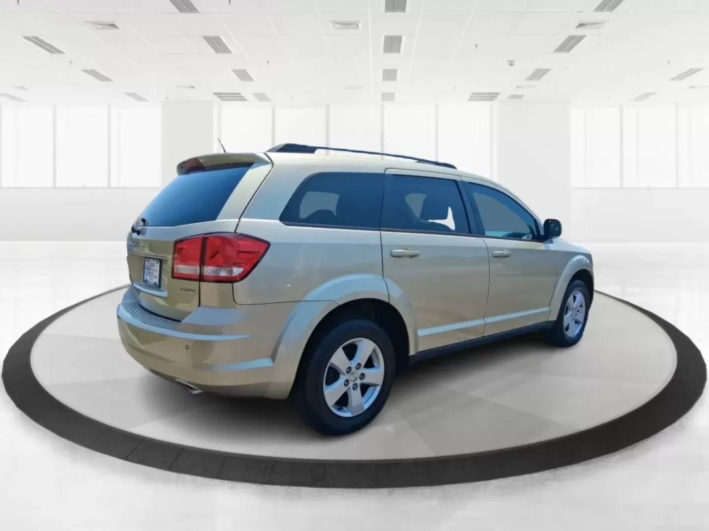 2011 White Gold Dodge Journey Mainstreet (3D4PG1FG9BT) with an 3.6L V6 DOHC 24V engine, 6-Speed Automatic transmission, located at 4508 South Dixie Dr, Moraine, OH, 45439, (937) 908-9800, 39.689976, -84.218452 - Are you in search of a versatile SUV that fits seamlessly into your active lifestyle? Look no further than this 2011 Dodge Journey Mainstreet, available now at Advantage Car and Credit - Moraine, located at 4508 South Dixie Dr, Moraine, OH 45439. This spacious and well-equipped SUV is not just a veh - Photo#2