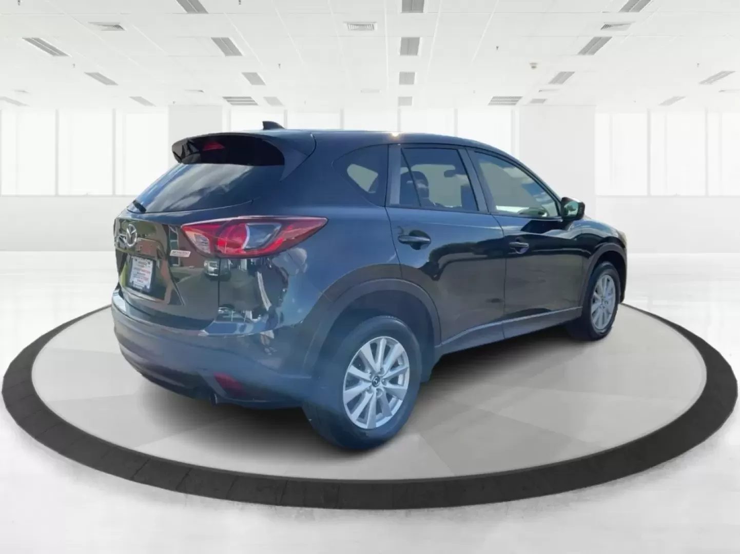 2014 Jet Black Mica Mazda CX-5 Touring AWD (JM3KE4CY2E0) with an 2.5L L4 DOHC 16V engine, 6-Speed Automatic transmission, located at 1099 N County Rd 25A , Troy, OH, 45373, (937) 908-9800, 40.057079, -84.212883 - **Explore the Open Road in the 2014 Mazda CX-5 Touring AWD from Advantage Car and Credit - Troy!**<br /> <br /> Are you ready to elevate your driving experience? Whether you're a growing family seeking a reliable SUV for weekend adventures, a commuter looking for comfort on long drives, or a budget- - Photo#2