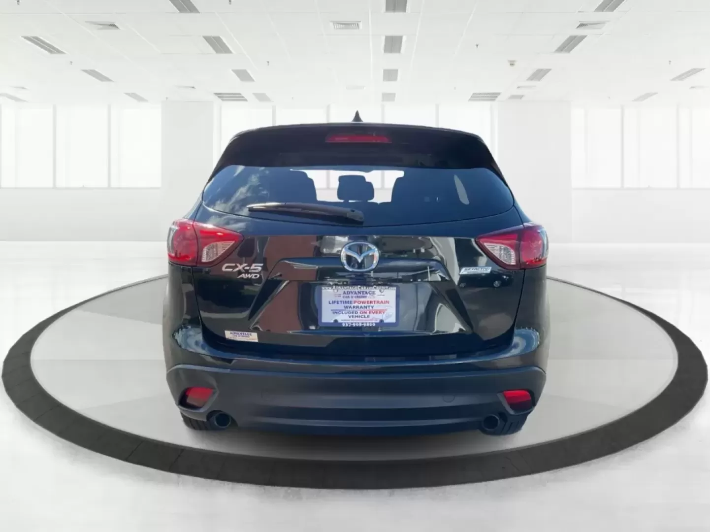 2014 Jet Black Mica Mazda CX-5 Touring AWD (JM3KE4CY2E0) with an 2.5L L4 DOHC 16V engine, 6-Speed Automatic transmission, located at 1099 N County Rd 25A , Troy, OH, 45373, (937) 908-9800, 40.057079, -84.212883 - **Explore the Open Road in the 2014 Mazda CX-5 Touring AWD from Advantage Car and Credit - Troy!**<br /> <br /> Are you ready to elevate your driving experience? Whether you're a growing family seeking a reliable SUV for weekend adventures, a commuter looking for comfort on long drives, or a budget- - Photo#3