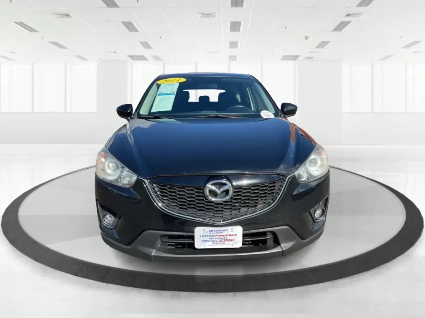 2014 Jet Black Mica Mazda CX-5 Touring AWD (JM3KE4CY2E0) with an 2.5L L4 DOHC 16V engine, 6-Speed Automatic transmission, located at 1099 N County Rd 25A , Troy, OH, 45373, (937) 908-9800, 40.057079, -84.212883 - **Explore the Open Road in the 2014 Mazda CX-5 Touring AWD from Advantage Car and Credit - Troy!**<br /> <br /> Are you ready to elevate your driving experience? Whether you're a growing family seeking a reliable SUV for weekend adventures, a commuter looking for comfort on long drives, or a budget- - Photo#7