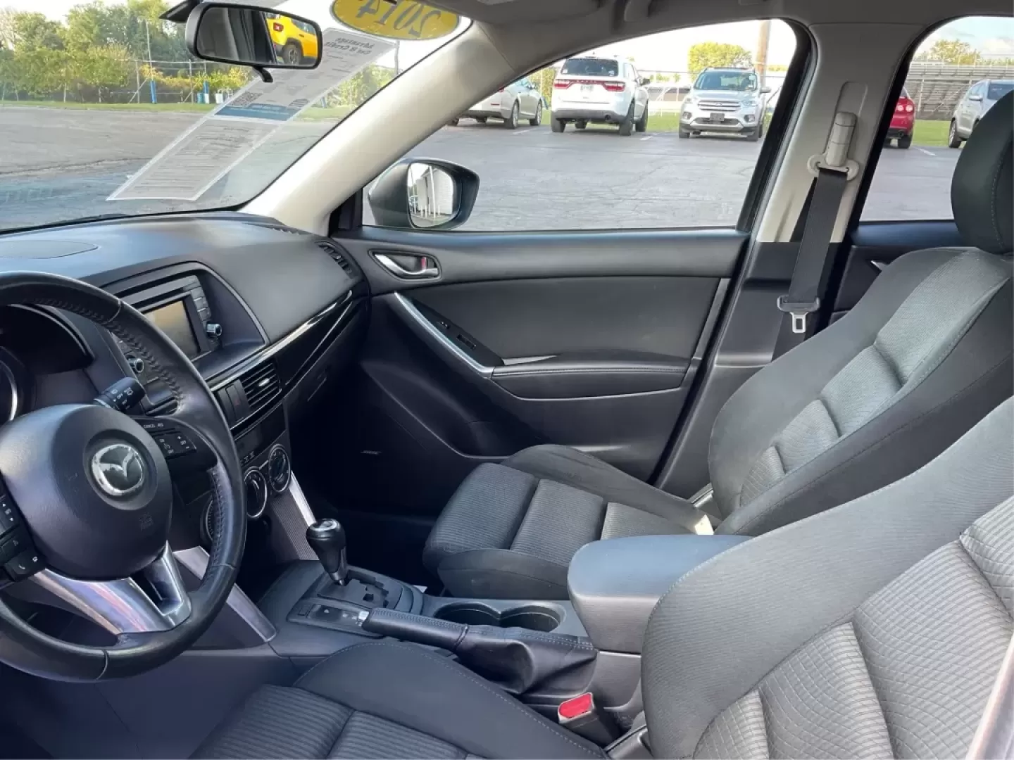 2014 Jet Black Mica Mazda CX-5 Touring AWD (JM3KE4CY2E0) with an 2.5L L4 DOHC 16V engine, 6-Speed Automatic transmission, located at 1099 N County Rd 25A , Troy, OH, 45373, (937) 908-9800, 40.057079, -84.212883 - **Explore the Open Road in the 2014 Mazda CX-5 Touring AWD from Advantage Car and Credit - Troy!**<br /> <br /> Are you ready to elevate your driving experience? Whether you're a growing family seeking a reliable SUV for weekend adventures, a commuter looking for comfort on long drives, or a budget- - Photo#9