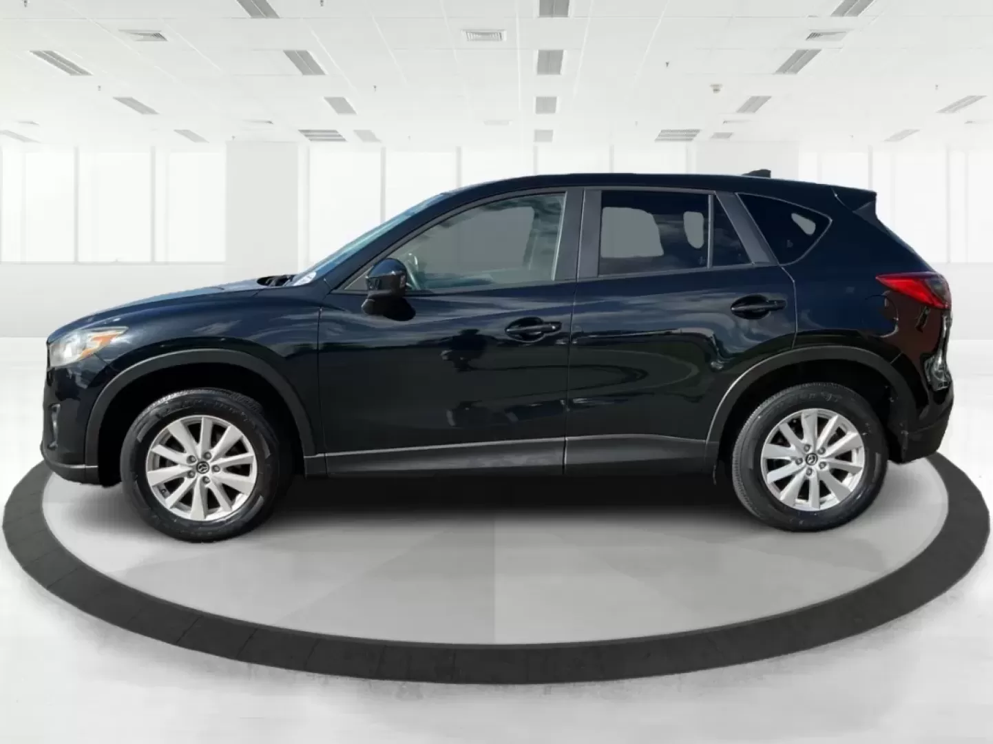 2014 Jet Black Mica Mazda CX-5 Touring AWD (JM3KE4CY2E0) with an 2.5L L4 DOHC 16V engine, 6-Speed Automatic transmission, located at 880 E. National Road, Vandalia, OH, 45377, (937) 908-9800, 39.891918, -84.183594 - **Explore the Open Road in the 2014 Mazda CX-5 Touring AWD from Advantage Car and Credit - Troy!**<br /> <br /> Are you ready to elevate your driving experience? Whether you're a growing family seeking a reliable SUV for weekend adventures, a commuter looking for comfort on long drives, or a budget- - Photo#5