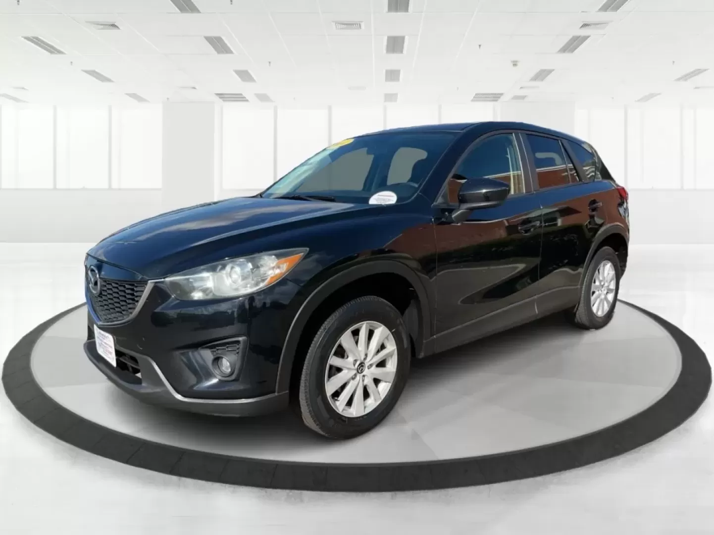 2014 Jet Black Mica Mazda CX-5 Touring AWD (JM3KE4CY2E0) with an 2.5L L4 DOHC 16V engine, 6-Speed Automatic transmission, located at 880 E. National Road, Vandalia, OH, 45377, (937) 908-9800, 39.891918, -84.183594 - **Explore the Open Road in the 2014 Mazda CX-5 Touring AWD from Advantage Car and Credit - Troy!**<br /> <br /> Are you ready to elevate your driving experience? Whether you're a growing family seeking a reliable SUV for weekend adventures, a commuter looking for comfort on long drives, or a budget- - Photo#8