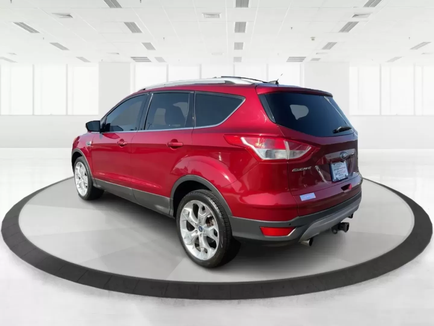 2013 Ruby Red Metallic Tinted Ford Escape Titanium 4WD (1FMCU9J92DU) with an 2.0L L4 DOHC 16V engine, 6-Speed Automatic transmission, located at 4508 South Dixie Dr, Moraine, OH, 45439, (937) 908-9800, 39.689976, -84.218452 - **Discover Your Next Adventure with the 2013 Ford Escape Titanium 4WD!**<br /> <br /> Looking for a reliable SUV that fits your adventurous lifestyle? The 2013 Ford Escape Titanium 4WD is perfect for those who love weekend getaways, family road trips, or tackling daily commutes with style and comfor - Photo#4