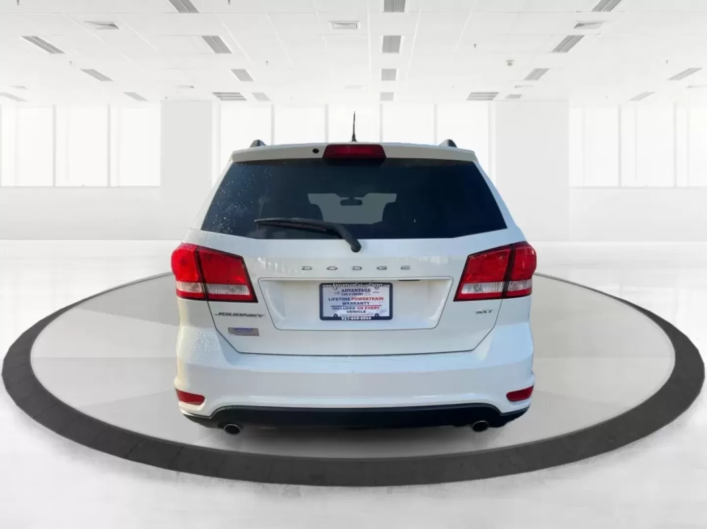 2014 Pearl White Tri-Coat Dodge Journey SXT (3C4PDCBG0ET) with an 3.6L V6 DOHC 24V engine, 6-Speed Automatic transmission, located at 1099 N County Rd 25A , Troy, OH, 45373, (937) 908-9800, 40.057079, -84.212883 - Are you looking for the perfect blend of comfort, versatility, and reliability for your family adventures? Look no further than the 2014 Dodge Journey SXT, available now at Advantage Car and Credit in Troy, OH. This well-equipped SUV is ideal for growing families, weekend road trips, or anyone who n - Photo#3