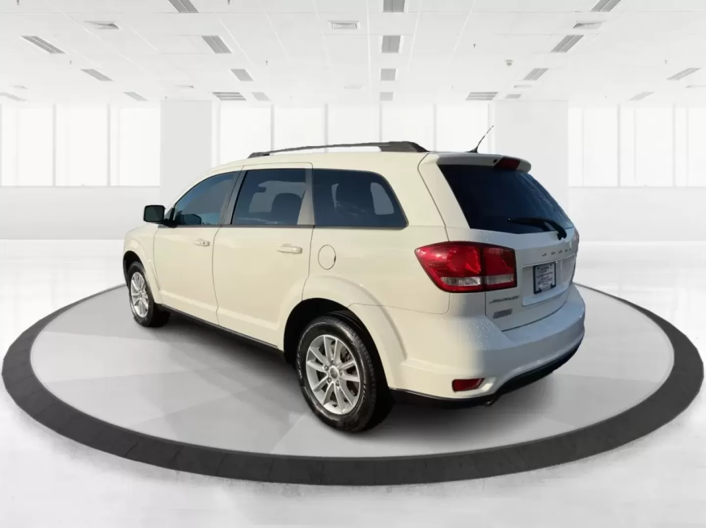 2014 Pearl White Tri-Coat Dodge Journey SXT (3C4PDCBG0ET) with an 3.6L V6 DOHC 24V engine, 6-Speed Automatic transmission, located at 1099 N County Rd 25A , Troy, OH, 45373, (937) 908-9800, 40.057079, -84.212883 - Are you looking for the perfect blend of comfort, versatility, and reliability for your family adventures? Look no further than the 2014 Dodge Journey SXT, available now at Advantage Car and Credit in Troy, OH. This well-equipped SUV is ideal for growing families, weekend road trips, or anyone who n - Photo#4