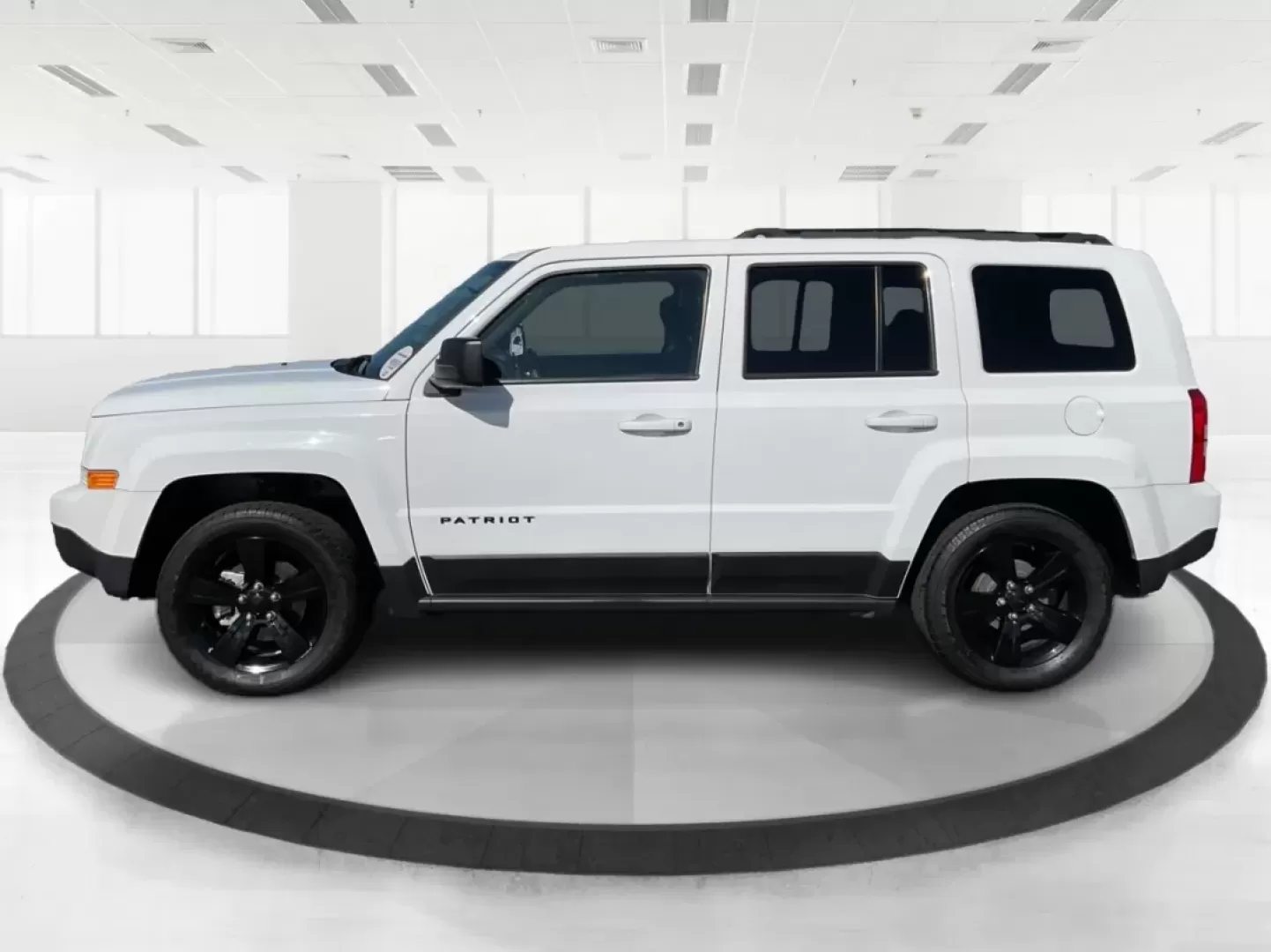 2015 Jeep Patriot Altitude Edition (1C4NJPBA1FD) with an 2L I-4 DOHC engine, located at 1951 S Dayton Lakeview Rd., New Carlisle, OH, 45344, (937) 908-9800, 39.890999, -84.050255 - Are you ready to elevate your adventures and embrace a life filled with excitement? If you're a weekend wanderer or a growing family looking for a reliable SUV, the 2015 Jeep Patriot Altitude Edition at Advantage Car and Credit is here to meet your needs. With its spacious interior, rugged design, a - Photo#3