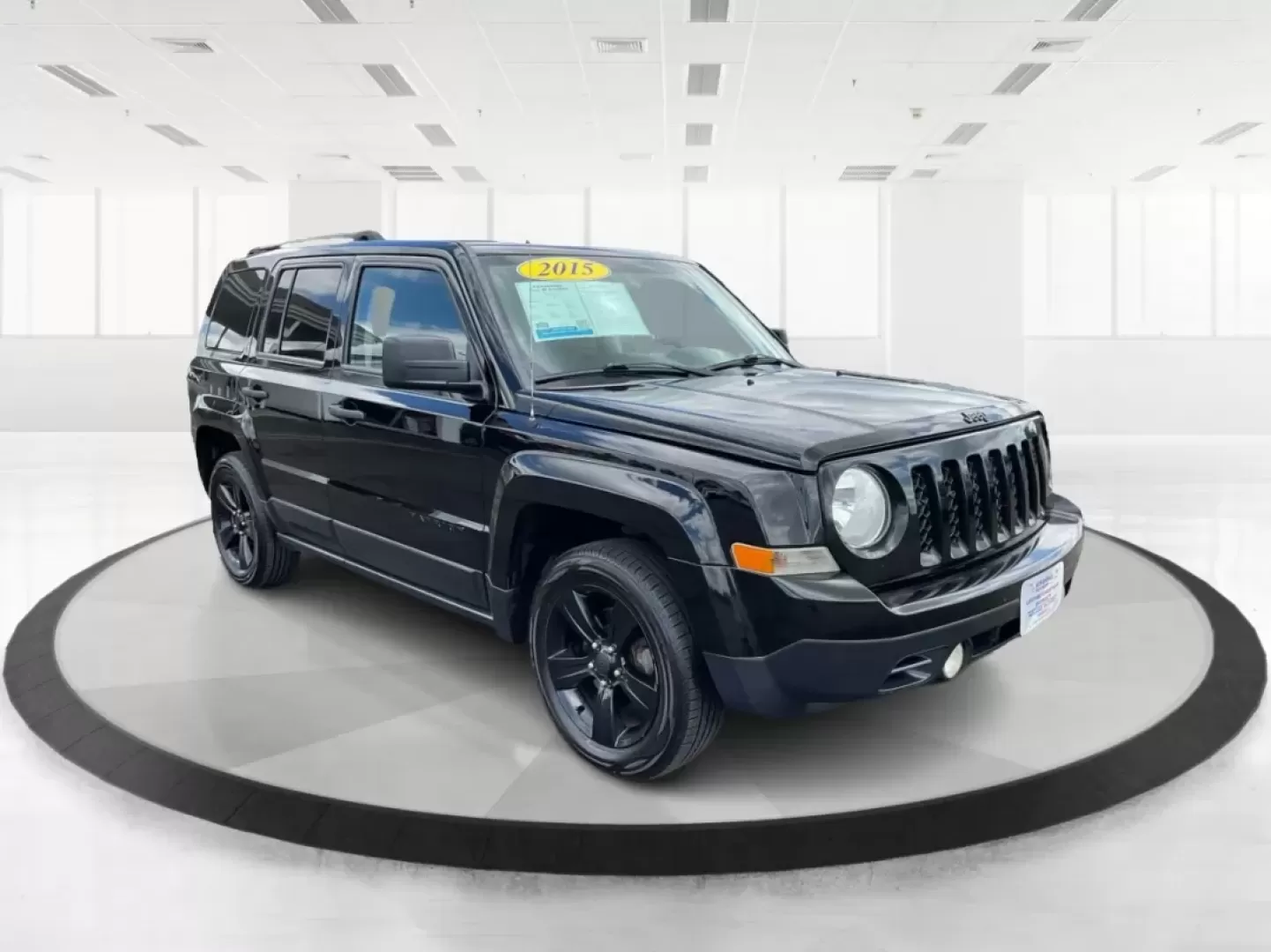 2015 Black Clearcoat Jeep Patriot Sport 2WD (1C4NJPBA6FD) with an 2.0L L4 DOHC 16V engine, located at 1099 N County Rd 25A , Troy, OH, 45373, (937) 908-9800, 40.057079, -84.212883 - **Adventure Awaits in the 2015 Jeep Patriot Your Perfect Companion for Weekend Getaways!**<br /> <br /> Imagine hitting the open road with the wind in your hair, the sound of your favorite playlist filling the cabin, and the freedom to explore every hidden gem along the way. The 2015 Jeep Patriot i - Photo#0