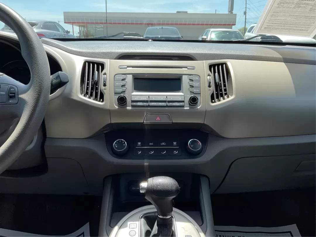 2015 Kia Sportage LX (KNDPBCAC7F7) with an Other engine, located at 880 E. National Road, Vandalia, OH, 45377, (937) 908-9800, 39.891918, -84.183594 - **Explore the Open Road with the 2015 Kia Sportage LX Perfect for Your Next Adventure!**<br /> <br /> Imagine hitting the open road with your loved ones, whether it's a weekend getaway or a daily commute. The 2015 Kia Sportage LX, available at Advantage Car and Credit in Fairborn, OH, is the ideal - Photo#13