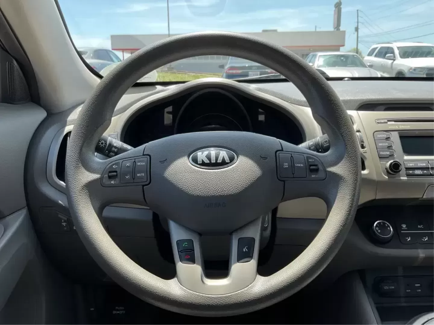 2015 Kia Sportage LX (KNDPBCAC7F7) with an 2.4L V6 DOHC 24V engine, 6-Speed Automatic transmission, located at 4508 South Dixie Dr, Moraine, OH, 45439, (937) 908-9800, 39.689976, -84.218452 - **Explore the Open Road with the 2015 Kia Sportage LX Perfect for Your Next Adventure!**<br /> <br /> Imagine hitting the open road with your loved ones, whether it's a weekend getaway or a daily commute. The 2015 Kia Sportage LX, available at Advantage Car and Credit in Fairborn, OH, is the ideal - Photo#16