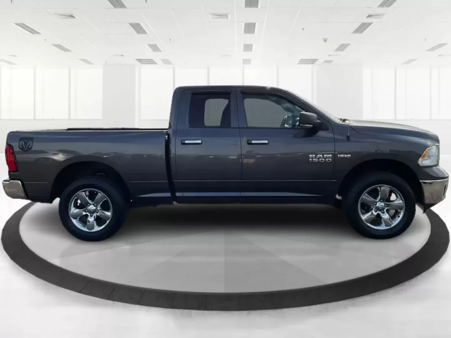 2015 Gray Ram 1500 SLT Quad Cab 4WD (1C6RR7GT3FS) with an 5.7L V8 OHV 16V engine, 8-Speed Automatic transmission, located at 1099 N County Rd 25A , Troy, OH, 45373, (937) 908-9800, 40.057079, -84.212883 - **Experience Adventure and Utility with this 2015 Ram 1500 SLT Quad Cab!**<br /> <br /> Are you ready to elevate your weekend adventures while ensuring your daily commute remains smooth and comfortable? Look no further than this robust 2015 Ram 1500 SLT Quad Cab, now available at Advantage Car and C - Photo#1
