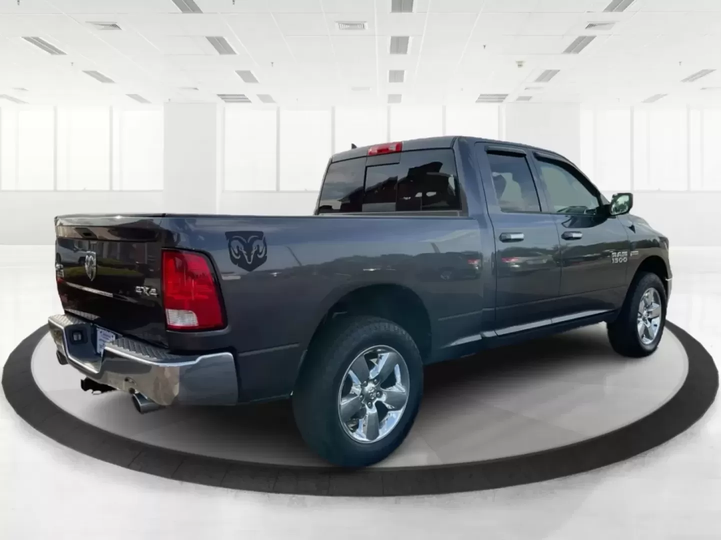 2015 Gray Ram 1500 SLT Quad Cab 4WD (1C6RR7GT3FS) with an 5.7L V8 OHV 16V engine, 8-Speed Automatic transmission, located at 1099 N County Rd 25A , Troy, OH, 45373, (937) 908-9800, 40.057079, -84.212883 - **Experience Adventure and Utility with this 2015 Ram 1500 SLT Quad Cab!**<br /> <br /> Are you ready to elevate your weekend adventures while ensuring your daily commute remains smooth and comfortable? Look no further than this robust 2015 Ram 1500 SLT Quad Cab, now available at Advantage Car and C - Photo#2